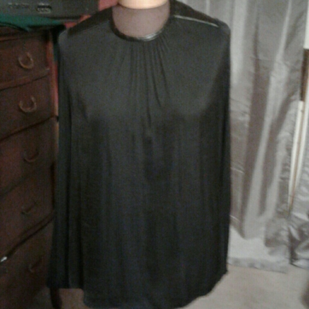 Long sleeve black XL 100 percent  polyester shirt.